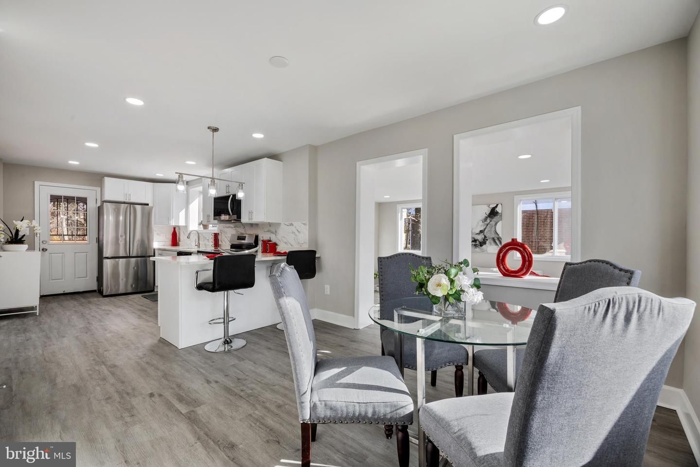 Dining room, Interior, Kitchen, Pendant Lights, Recessed Lighting, Stainless Steel Appliances, Wood Texture Flooring
