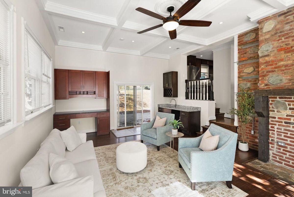 Fireplace, Interior, Living room, Recessed Lighting, Stone Walls, Wood Texture Flooring