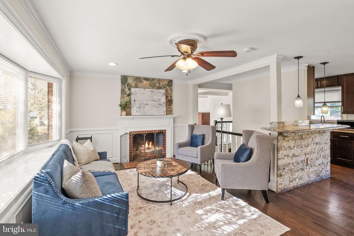 Fireplace, Interior, Living room, Pendant Lights, Recessed Lighting, Stone Walls, Wood Texture Flooring