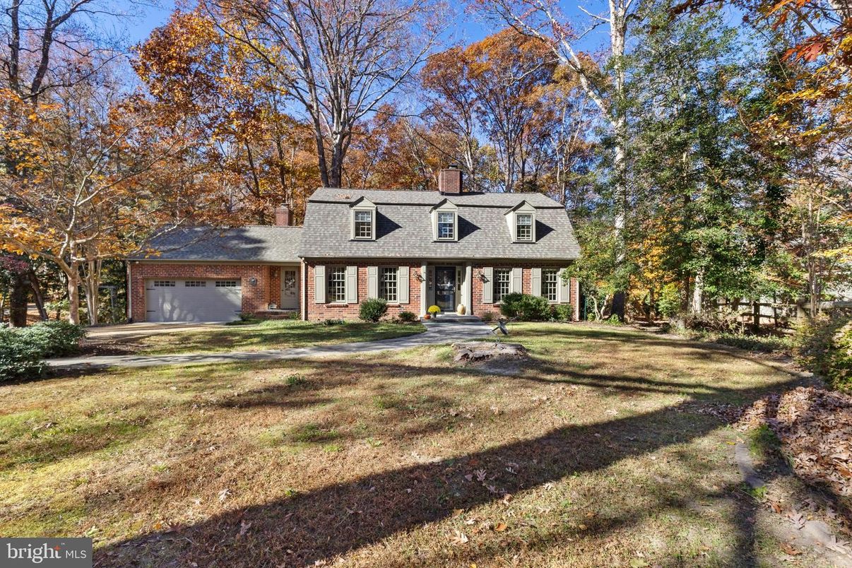 Attached, Backyard, Exterior, Facade, Brick Facade, Cape Cod