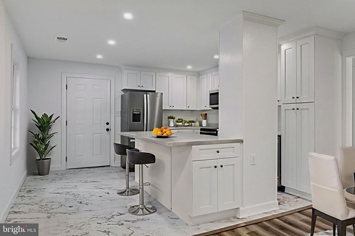 Interior, Kitchen, Marble, Recessed Lighting, Stainless Steel Appliances, Wood Texture Flooring