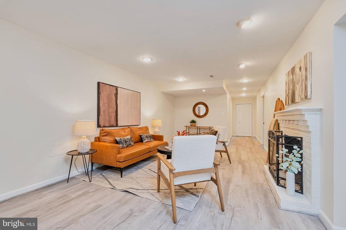 Dining room, Fireplace, Interior, Living room, Recessed Lighting, Wood Texture Flooring