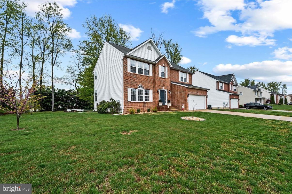 Attached, Backyard, Exterior, Facade, Brick Facade, Farmhouse