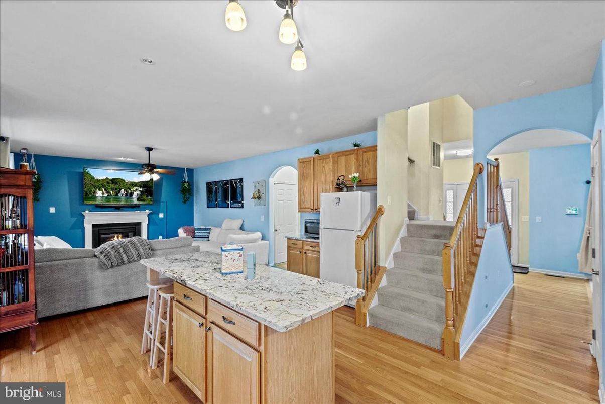 Fireplace, Interior, Kitchen, Living room, Recessed Lighting, Wood Texture Flooring