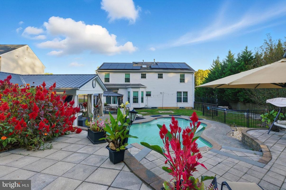 Exterior, Pool, Solar Panels