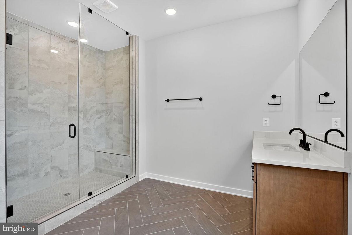 Bathroom, Glass Shower, Interior, Marble Walls, Recessed Lighting, Wood Texture Flooring