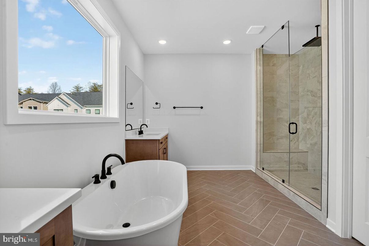 Bathroom, Free Standing Baths, Glass Shower, Interior, Recessed Lighting, Wood Texture Flooring