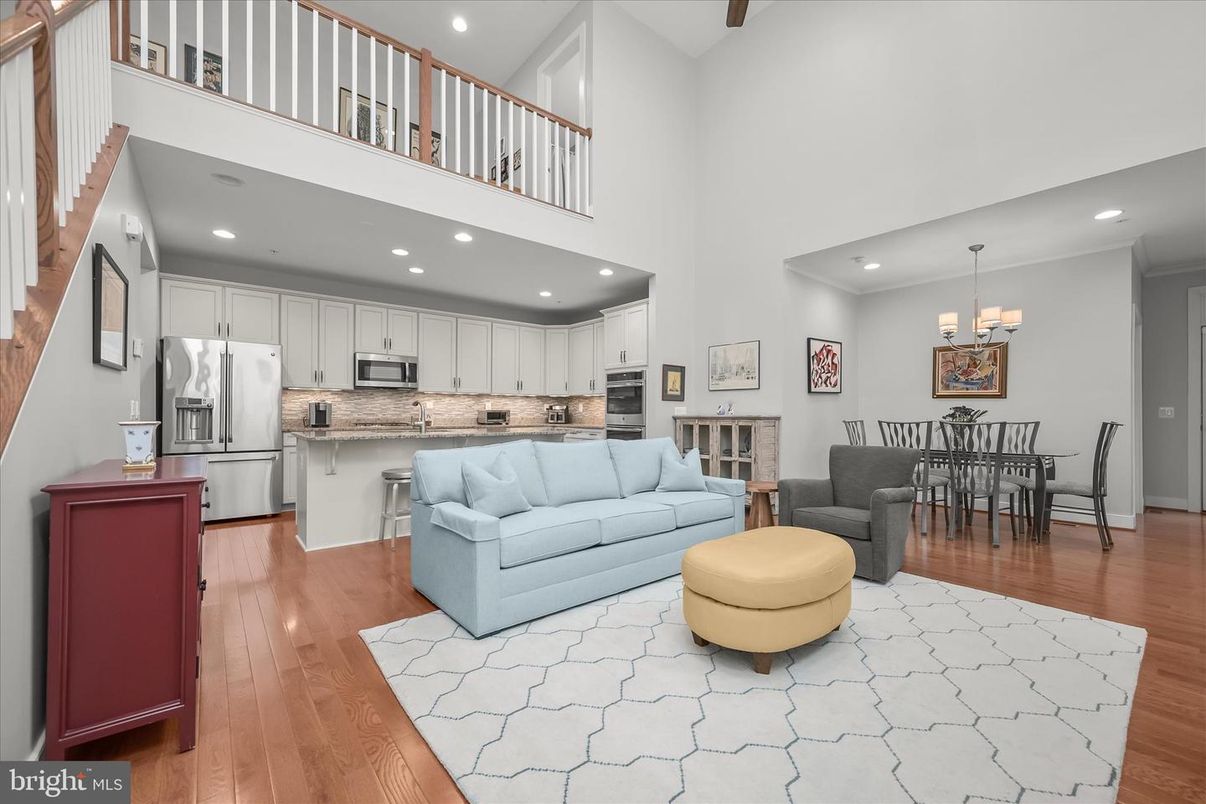 Chandelier, Dining room, Interior, Kitchen, Living room, Recessed Lighting, Stainless Steel Appliances, Wood Texture Flooring