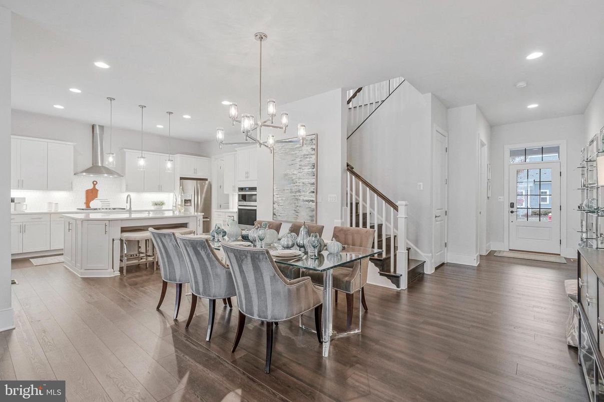 Dining room, Interior, Kitchen, Pendant Lights, Recessed Lighting, Stainless Steel Appliances, Wood Texture Flooring