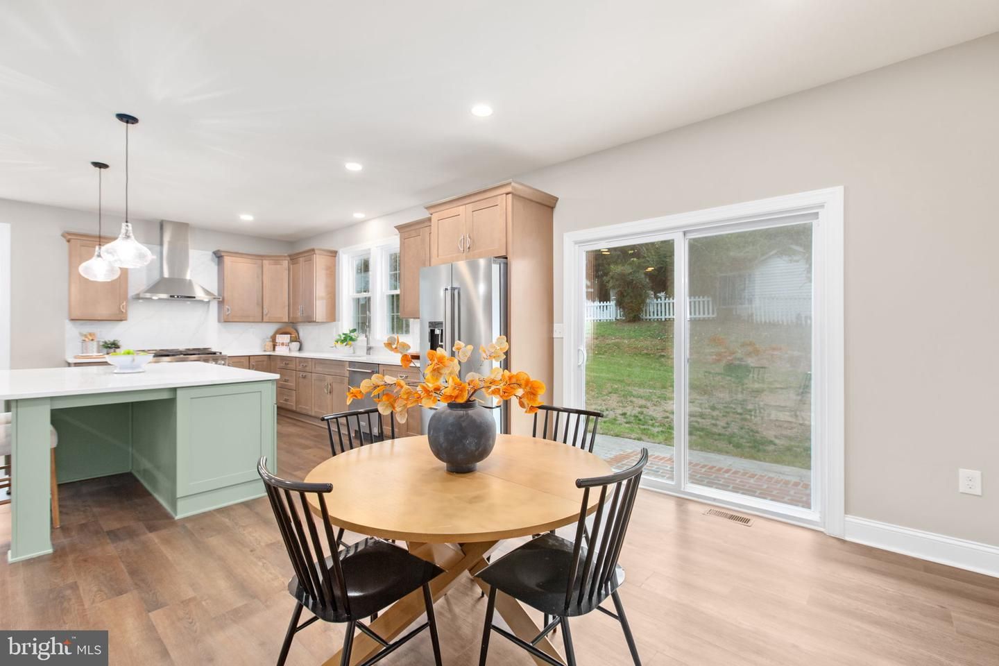 Dining room, Interior, Kitchen, Pendant Lights, Recessed Lighting, Stainless Steel Appliances, Wood Texture Flooring