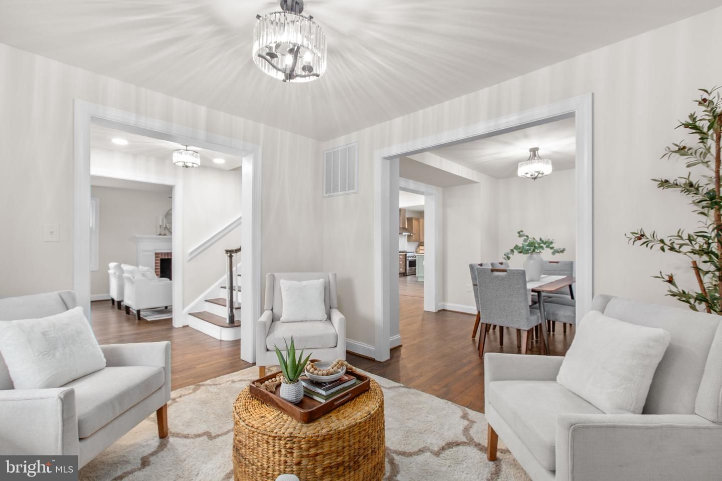 Chandelier, Dining room, Fireplace, Interior, Living room, Pendant Lights, Recessed Lighting, Wood Texture Flooring