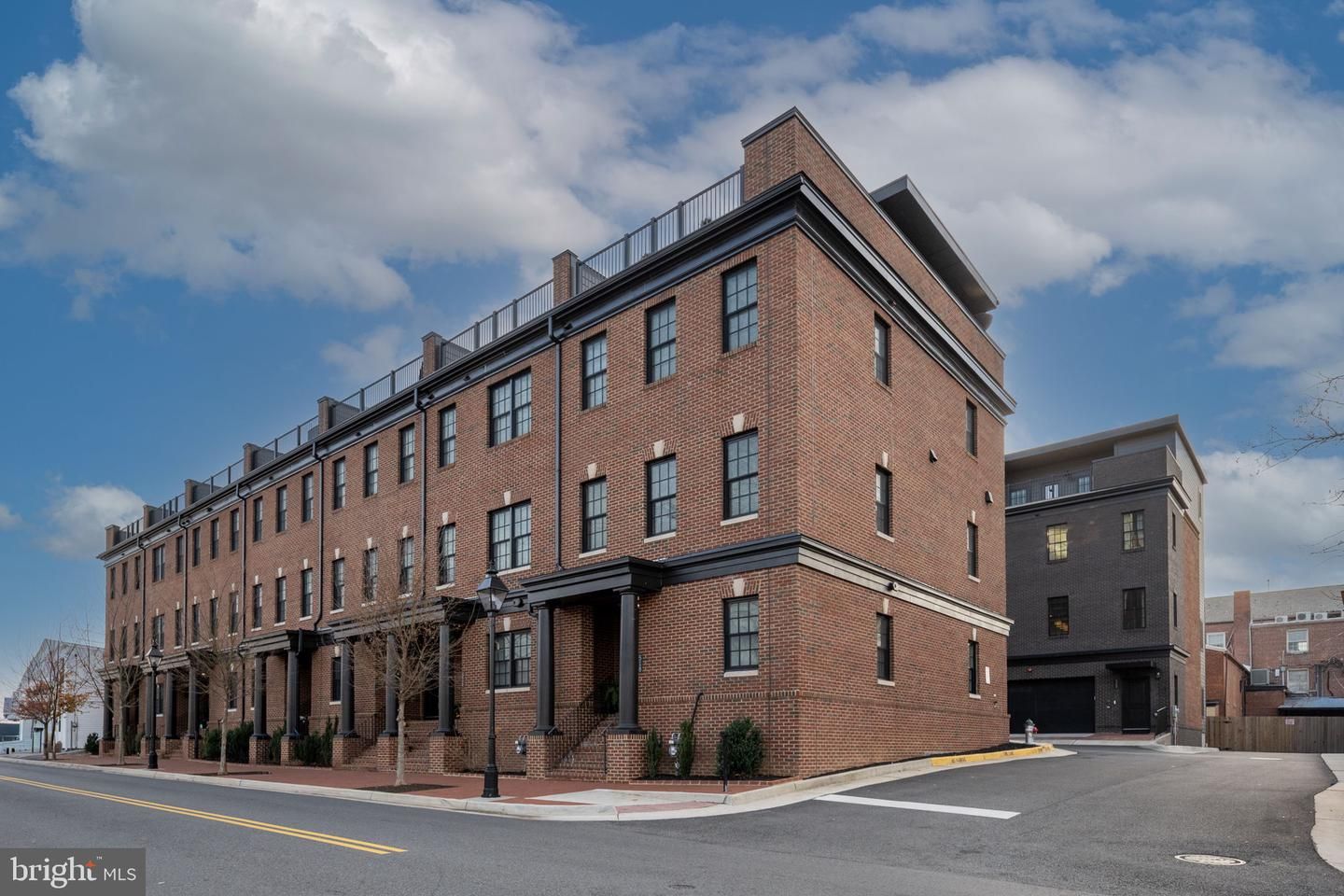 Exterior, Facade, Brick Facade, Condo Building