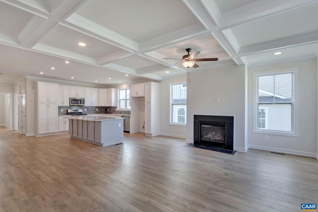 Empty room, Fireplace, Interior, Kitchen, Recessed Lighting, Wood Texture Flooring