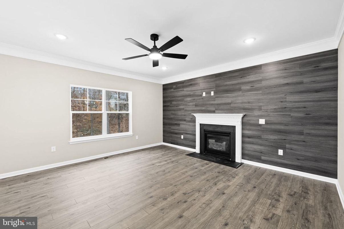 Empty room, Fireplace, Interior, Recessed Lighting, Wood Texture Flooring, Wooden Walls