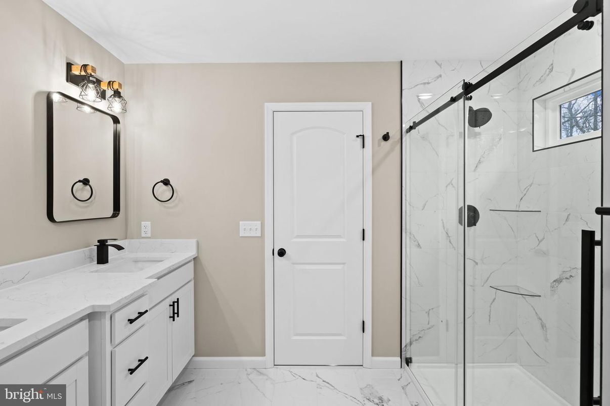 Bathroom, Dual Sink Vanities, Glass Shower, Interior, Marble, Marble Walls