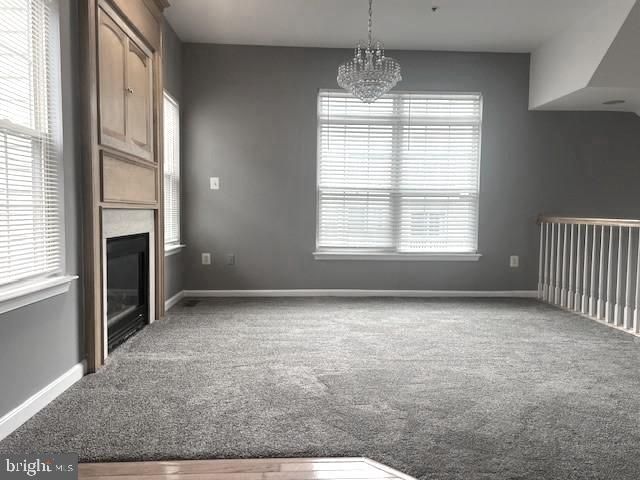 Chandelier, Empty room, Fireplace, Interior