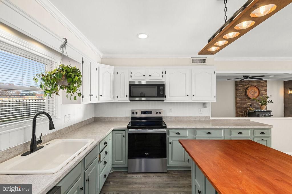 Interior, Kitchen, Recessed Lighting, Stainless Steel Appliances, Stone Walls, Wood Texture Flooring