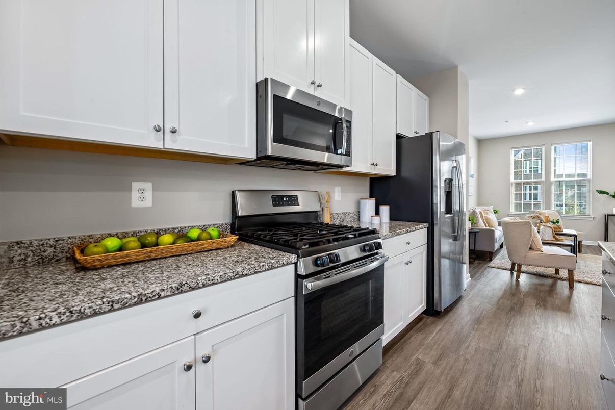 Dining room, Interior, Kitchen, Recessed Lighting, Stainless Steel Appliances, Wood Texture Flooring