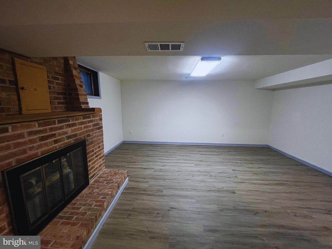 Empty room, Fireplace, Interior, Stone Walls, Wood Texture Flooring