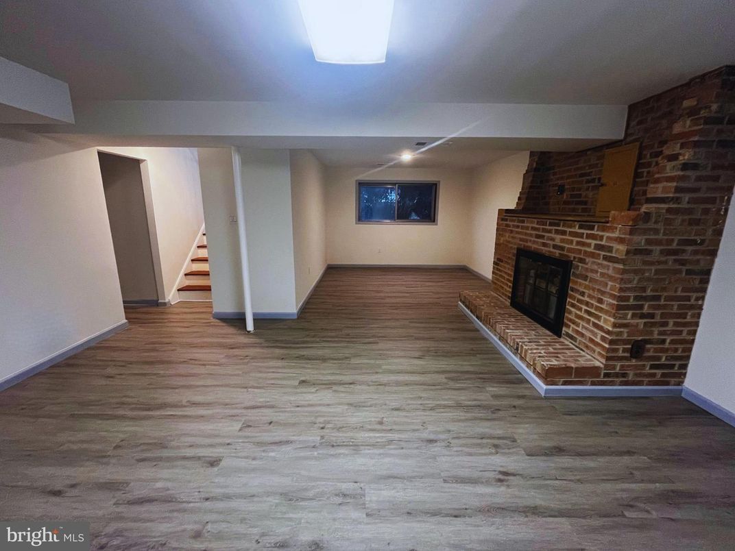 Empty room, Fireplace, Interior, Stone Walls, Wood Texture Flooring