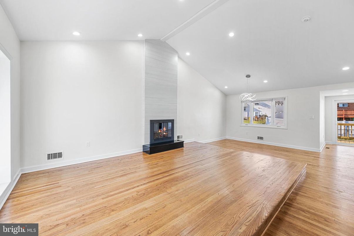 Empty room, Fireplace, Interior, Pendant Lights, Recessed Lighting, Wood Texture Flooring