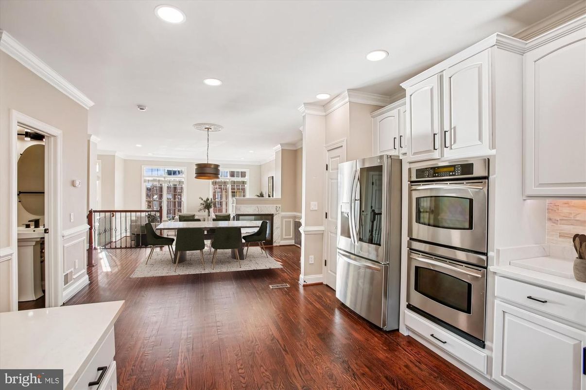 Dining room, Interior, Kitchen, Pendant Lights, Recessed Lighting, Stainless Steel Appliances, Wood Texture Flooring
