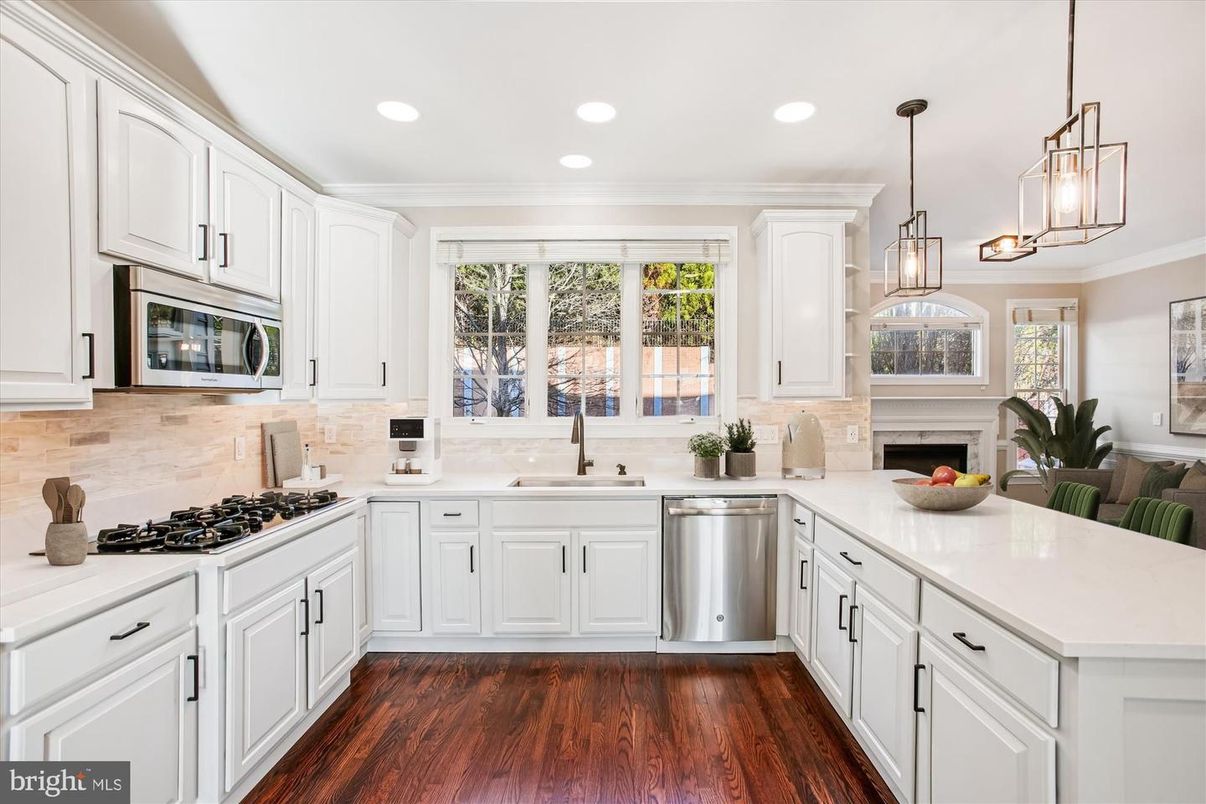 Fireplace, Interior, Kitchen, Pendant Lights, Recessed Lighting, Stainless Steel Appliances, Wood Texture Flooring