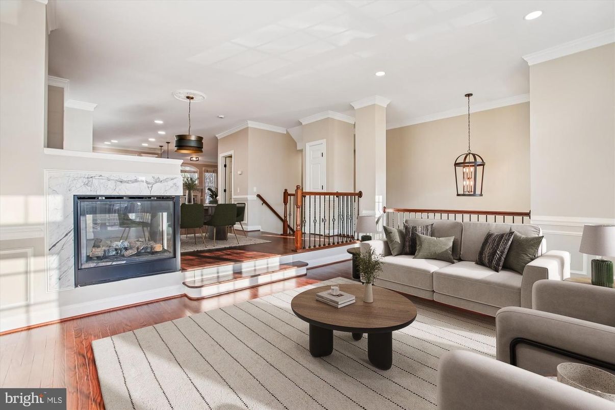 Dining room, Fireplace, Interior, Living room, Pendant Lights, Recessed Lighting, Wood Texture Flooring