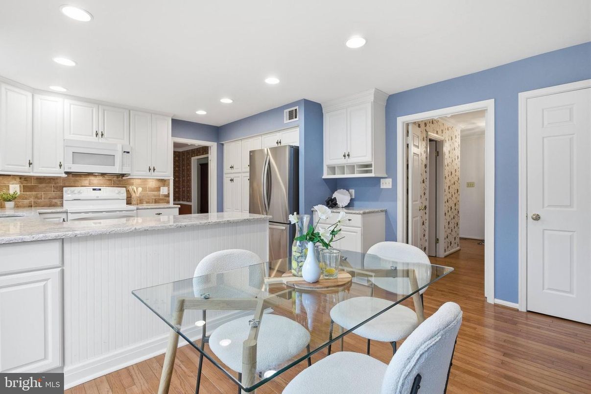 Dining room, Interior, Kitchen, Recessed Lighting, Stainless Steel Appliances, Wood Texture Flooring
