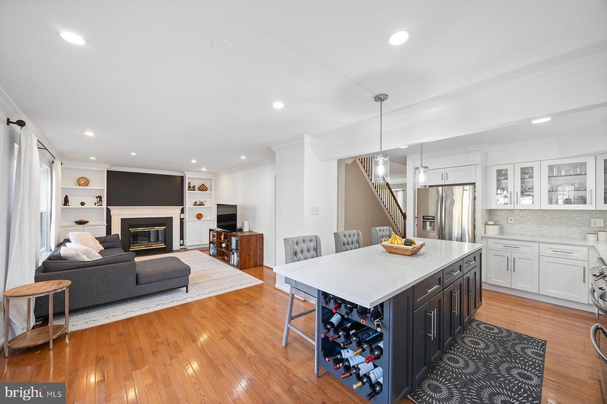 Dining room, Fireplace, Interior, Kitchen, Living room, Pendant Lights, Recessed Lighting, Stainless Steel Appliances, Wood Texture Flooring