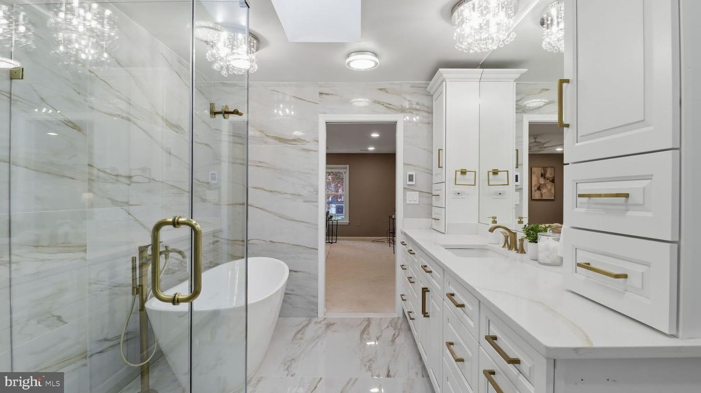 Bathroom, Dual Sink Vanities, Free Standing Baths, Glass Shower, Interior, Marble, Marble Walls, Recessed Lighting