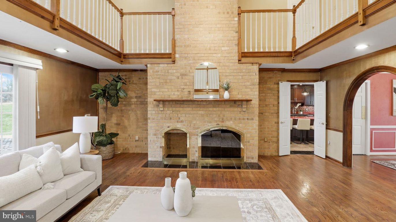 Fireplace, Interior, Living room, Recessed Lighting, Stone Walls, Wood Texture Flooring