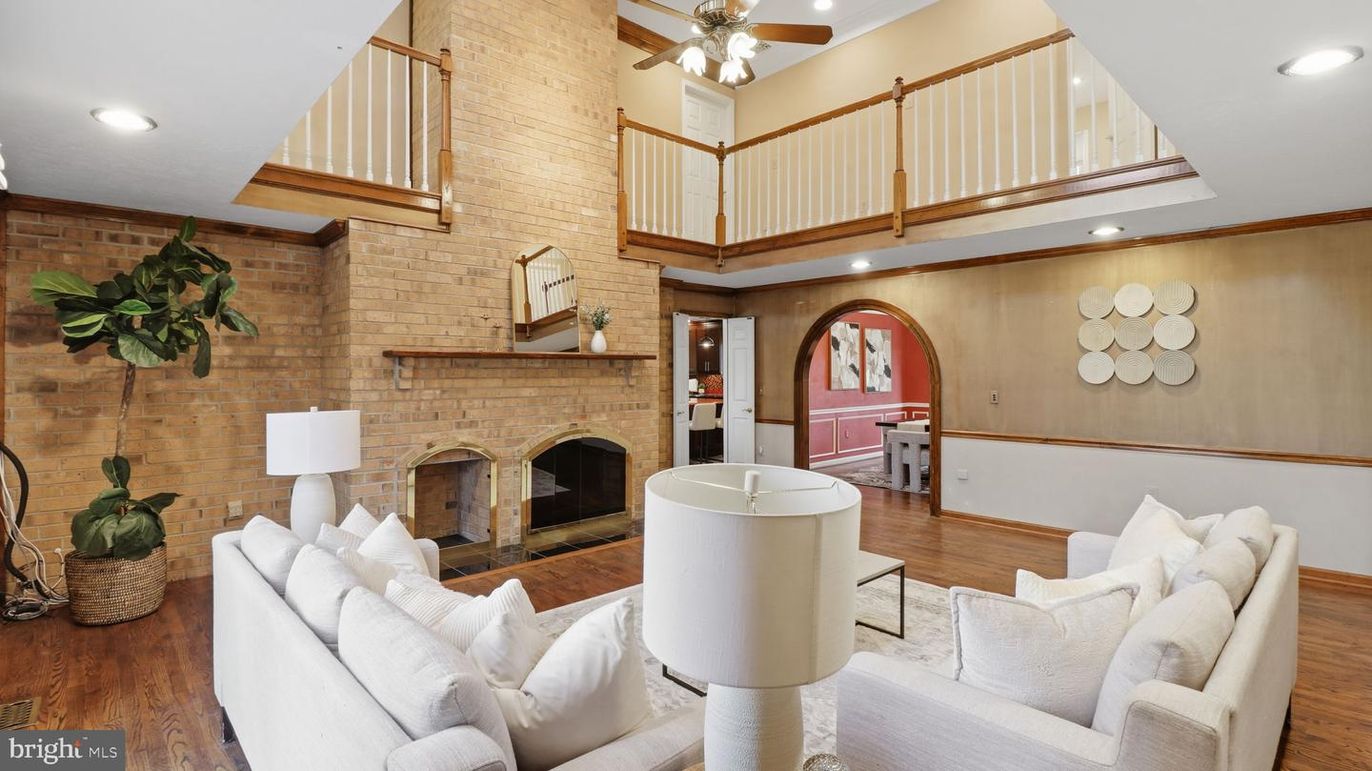 Fireplace, Interior, Living room, Recessed Lighting, Stone Walls, Wood Texture Flooring