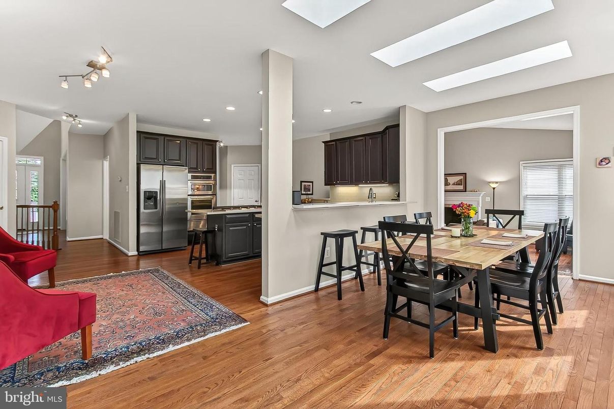 Dining room, Interior, Kitchen, Recessed Lighting, Stainless Steel Appliances, Wood Texture Flooring