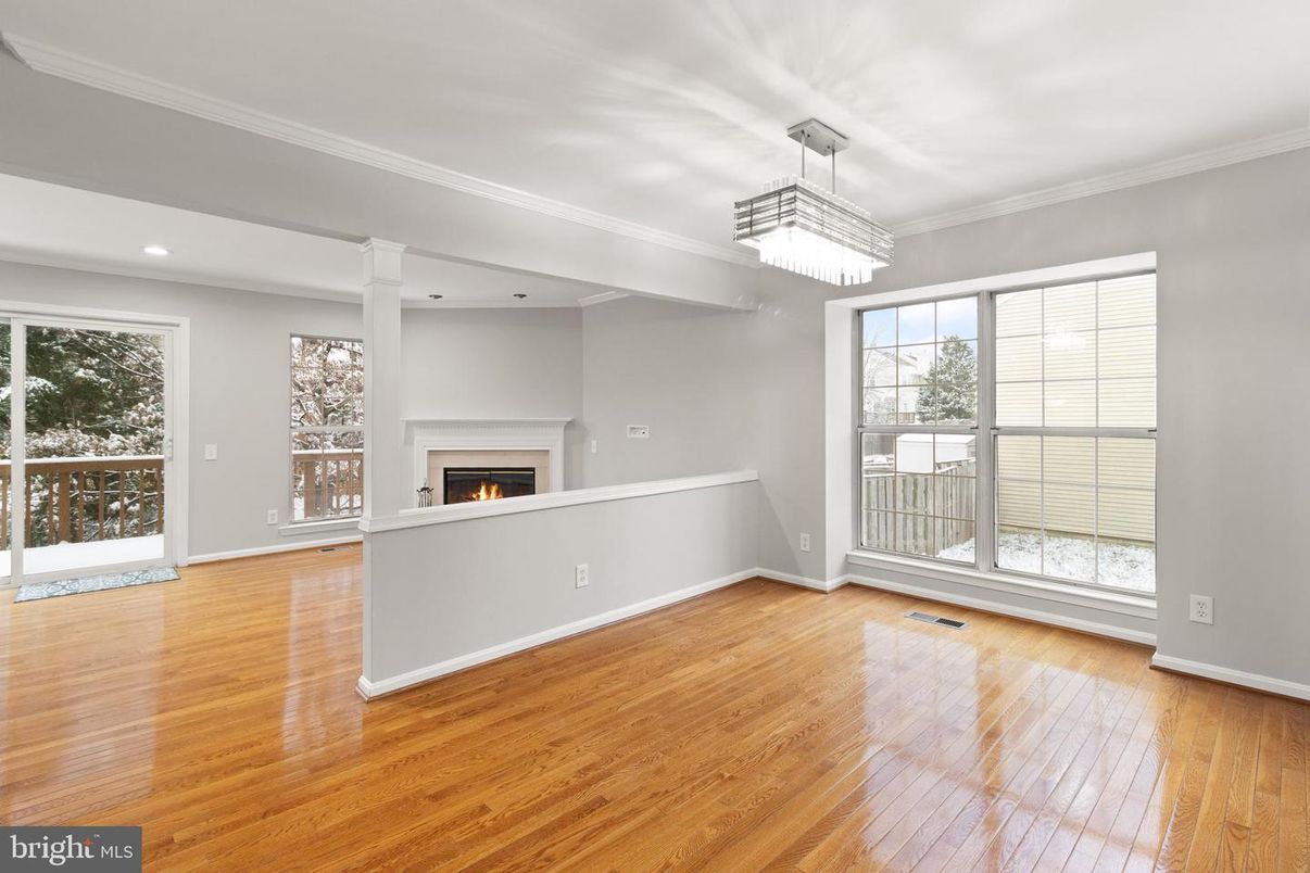 Chandelier, Empty room, Fireplace, Interior, Recessed Lighting, Wood Texture Flooring