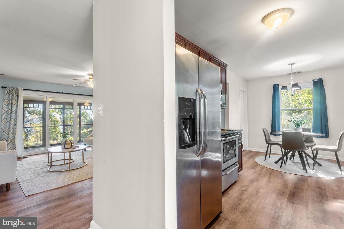 Dining room, Interior, Kitchen, Pendant Lights, Stainless Steel Appliances, Wood Texture Flooring