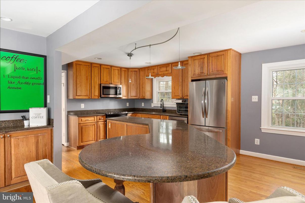 Dining room, Interior, Kitchen, Recessed Lighting, Stainless Steel Appliances, Wood Texture Flooring