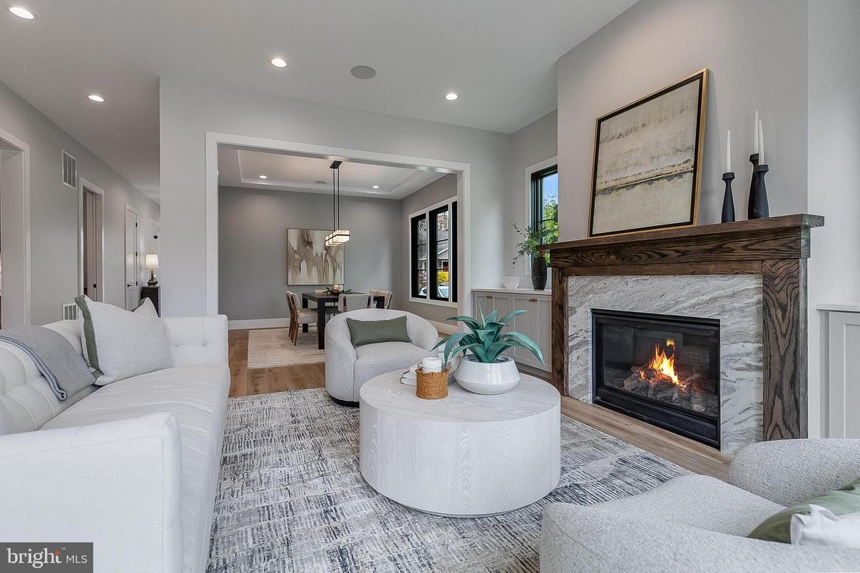 Dining room, Fireplace, Interior, Living room, Pendant Lights, Recessed Lighting, Wood Texture Flooring