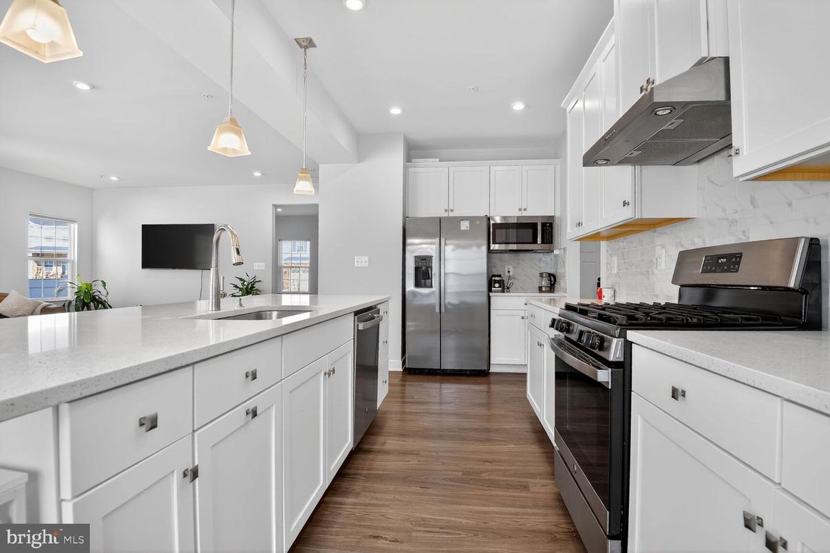 Interior, Kitchen, Pendant Lights, Recessed Lighting, Stainless Steel Appliances, Wood Texture Flooring