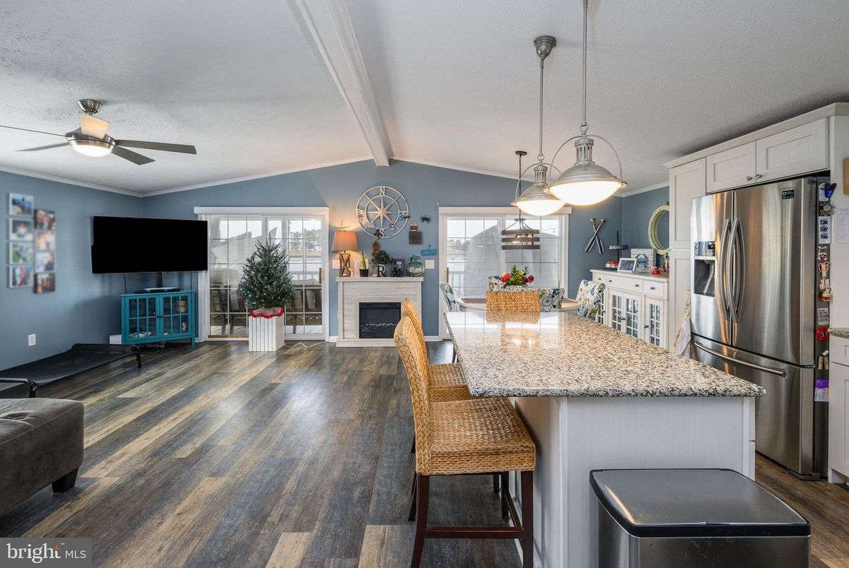 Fireplace, Interior, Kitchen, Pendant Lights, Stainless Steel Appliances, Wood Texture Flooring