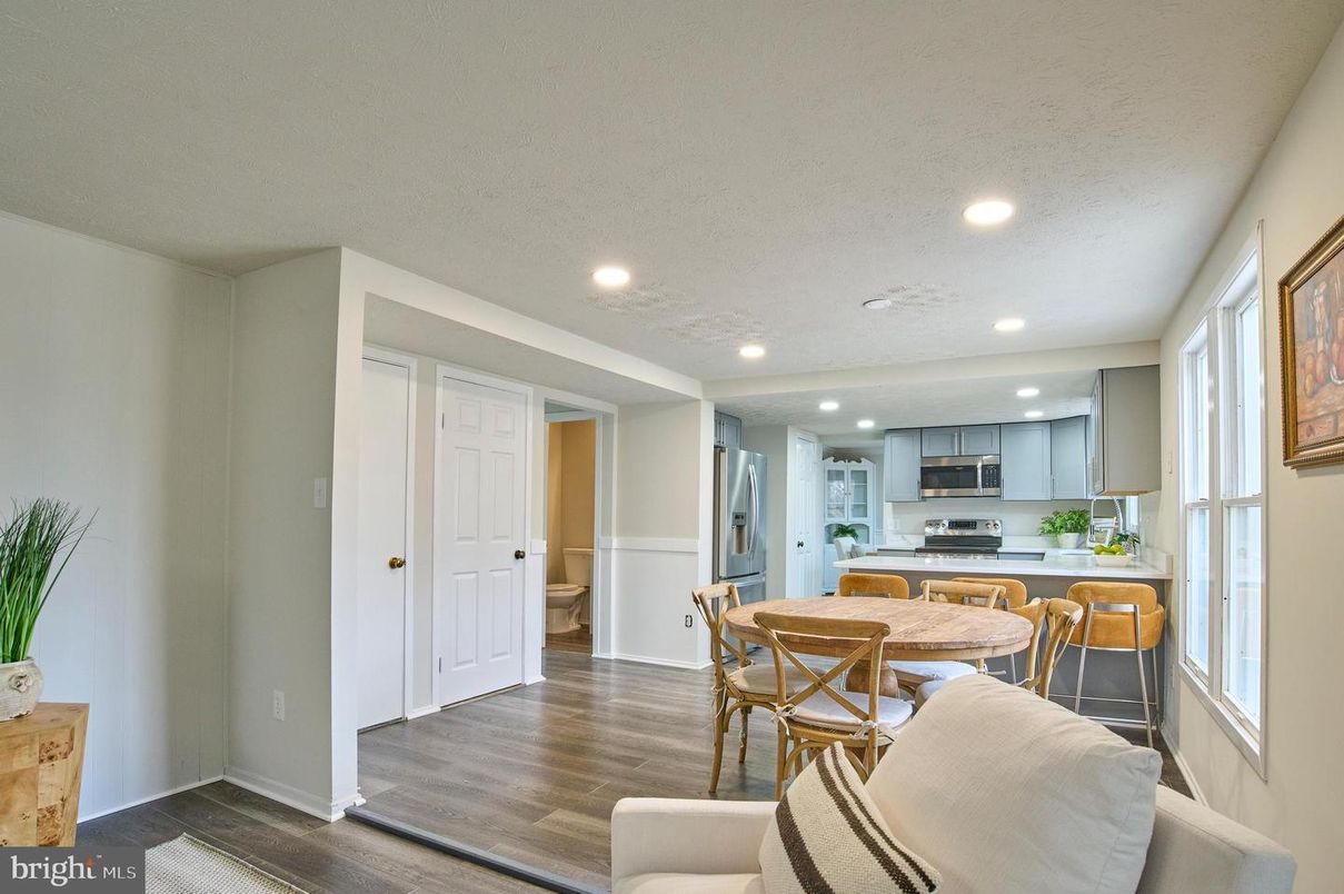 Dining room, Interior, Kitchen, Recessed Lighting, Stainless Steel Appliances, Wood Texture Flooring