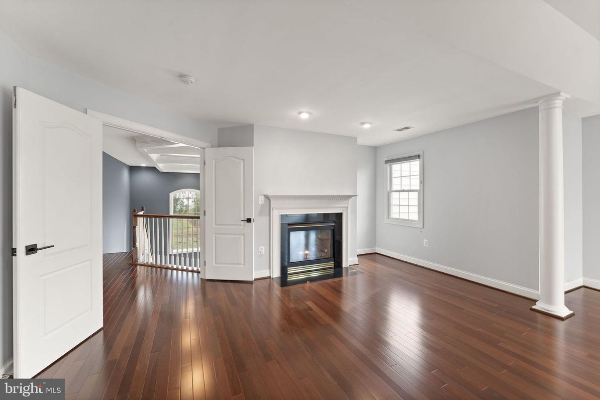 Empty room, Fireplace, Interior, Recessed Lighting, Wood Texture Flooring