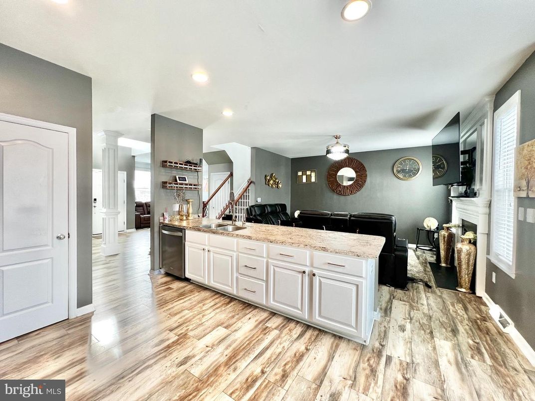 Fireplace, Interior, Kitchen, Recessed Lighting, Wood Texture Flooring