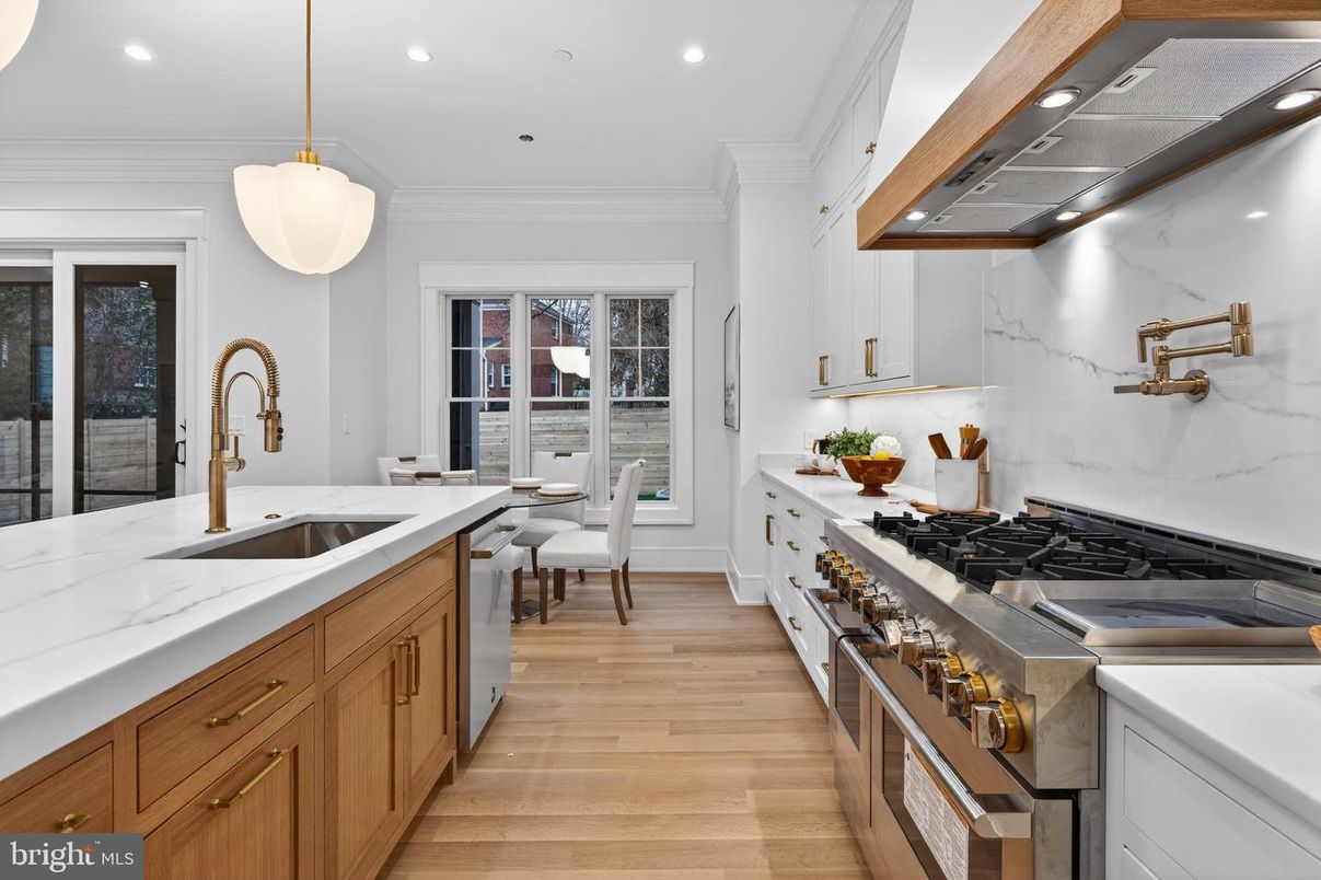 Dining room, Interior, Kitchen, Pendant Lights, Recessed Lighting, Stainless Steel Appliances, Wood Texture Flooring