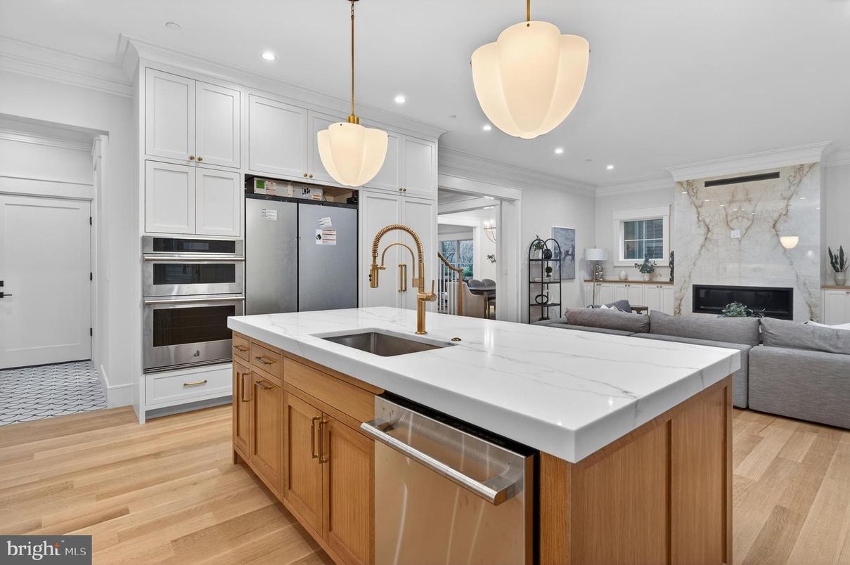 Fireplace, Interior, Kitchen, Living room, Pendant Lights, Recessed Lighting, Stainless Steel Appliances, Wood Texture Flooring