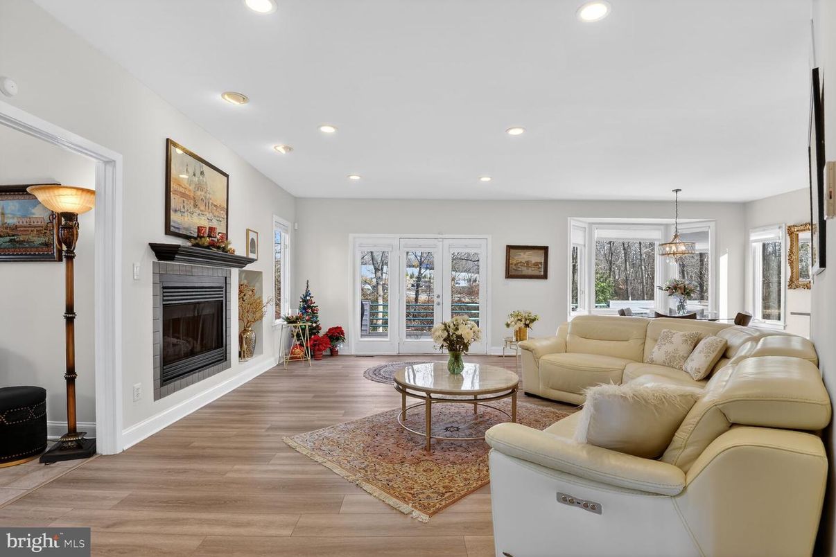 Dining room, Fireplace, Interior, Living room, Pendant Lights, Recessed Lighting, Wood Texture Flooring