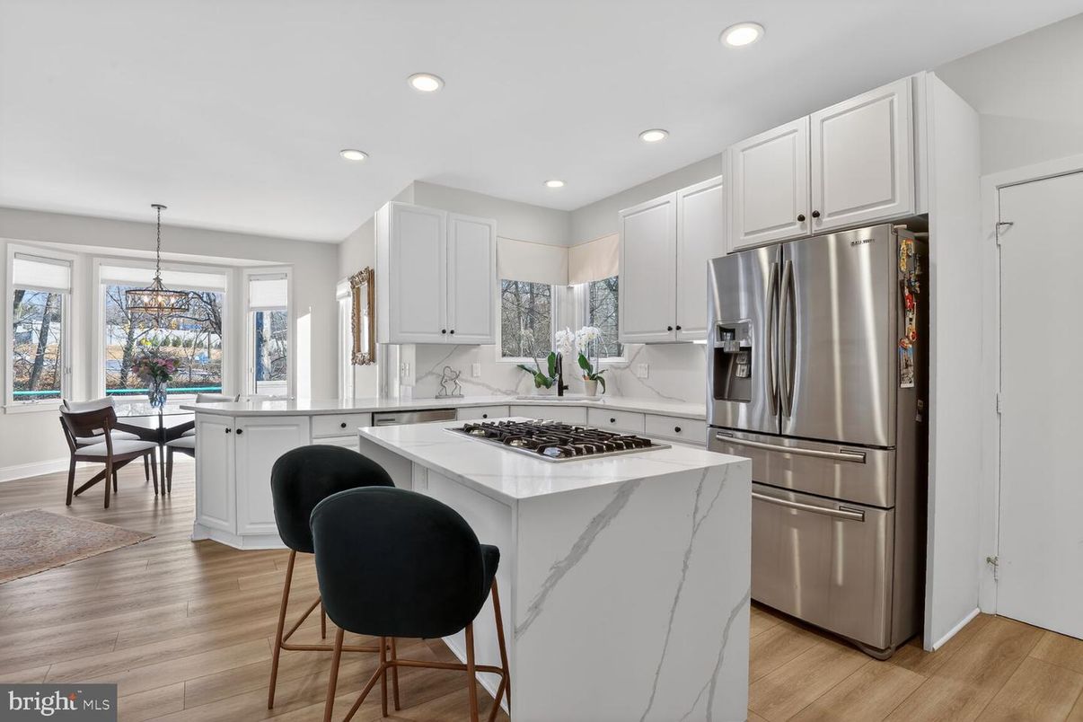 Dining room, Interior, Kitchen, Pendant Lights, Recessed Lighting, Stainless Steel Appliances, Wood Texture Flooring