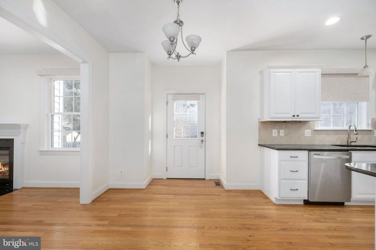 Chandelier, Fireplace, Interior, Kitchen, Pendant Lights, Recessed Lighting, Wood Texture Flooring