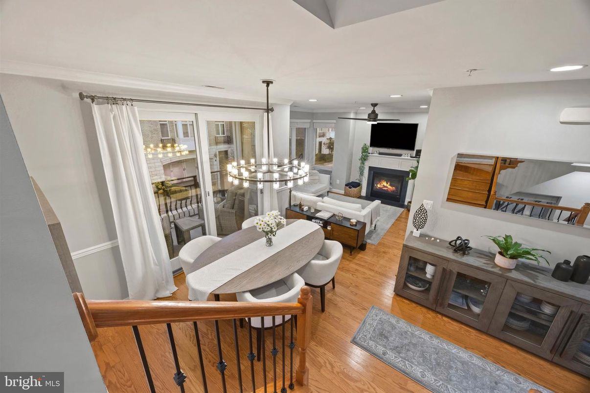 Dining room, Fireplace, Interior, Living room, Pendant Lights, Recessed Lighting, Wood Texture Flooring