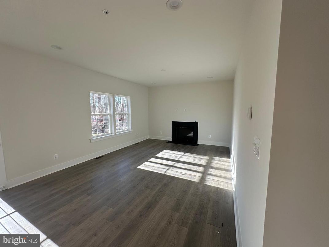 Empty room, Fireplace, Interior, Recessed Lighting, Wood Texture Flooring